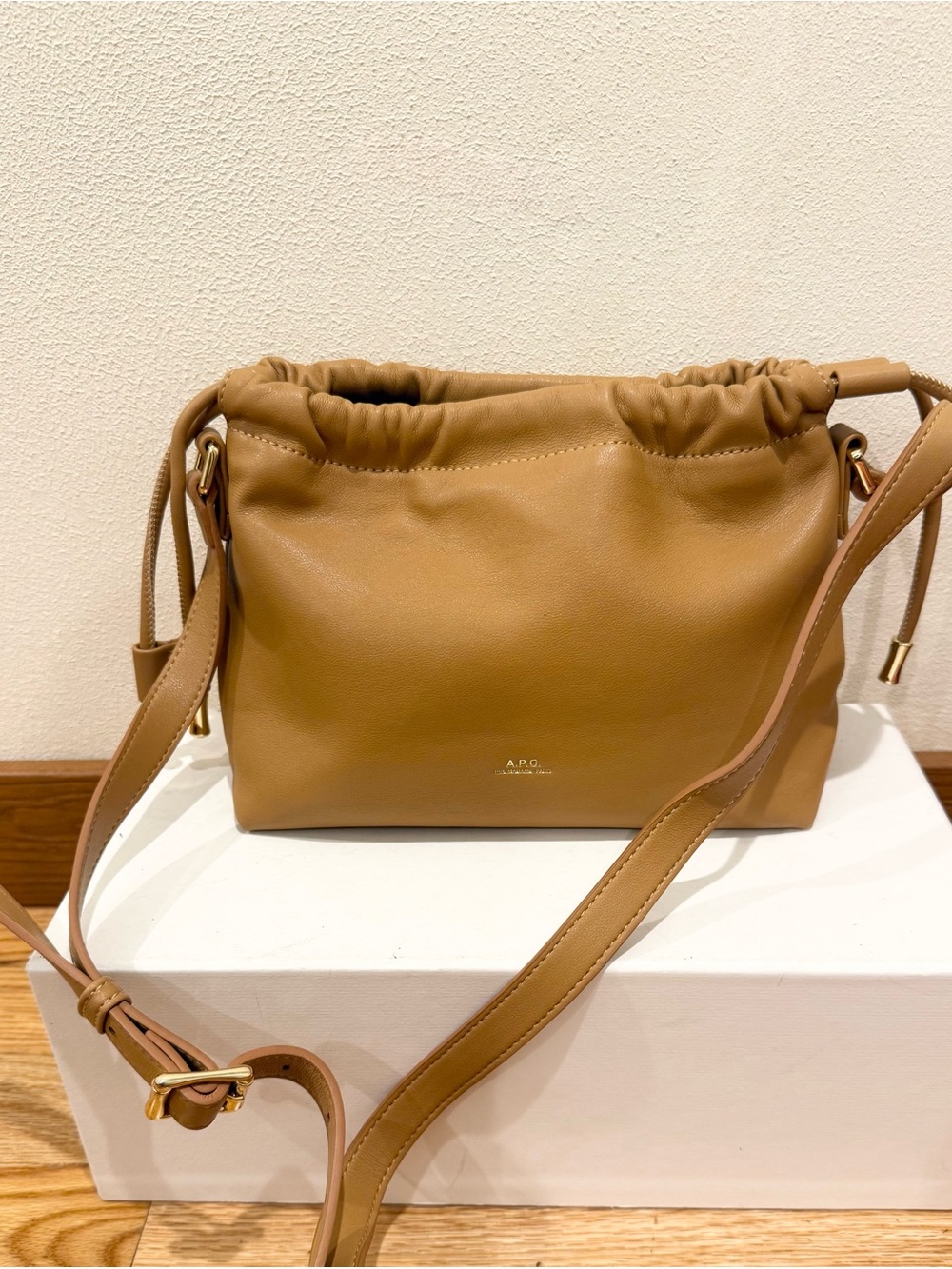 A.P.C. Tan Drawstring Leather Crossbody Bag with Gold Hardware